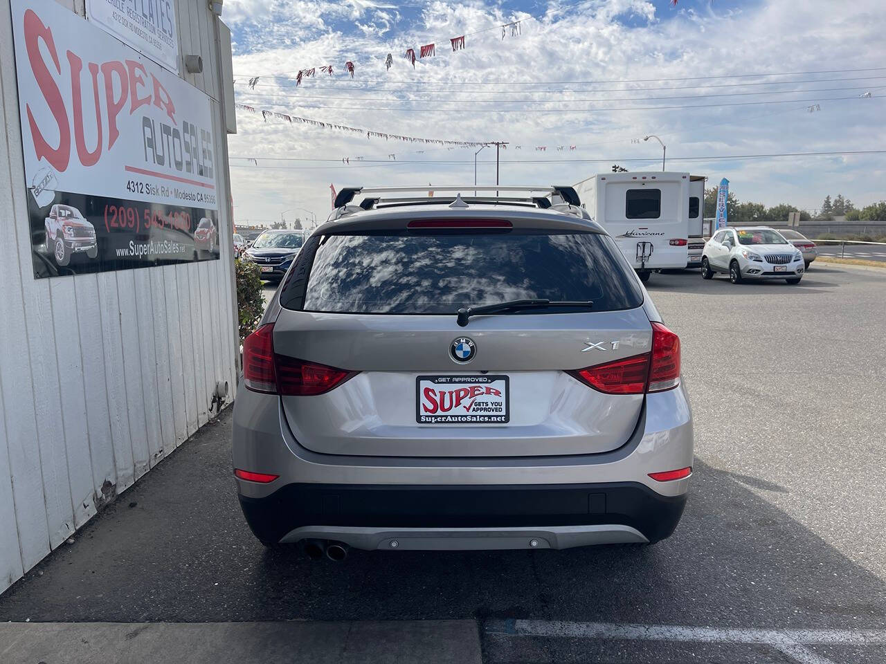 2014 BMW X1 for sale at Super Auto Sales Modesto in Modesto, CA