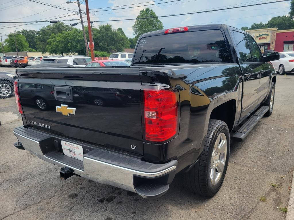 2015 Chevrolet Silverado 1500 for sale at DAGO'S AUTO SALES LLC in Dalton, GA