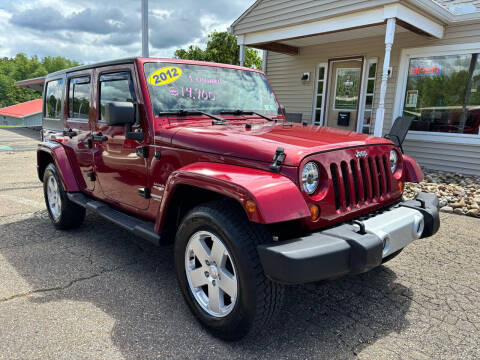 2012 Jeep Wrangler Unlimited for sale at G & G Auto Sales in Steubenville OH