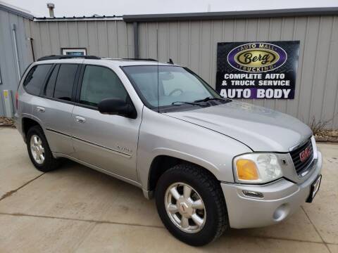 2006 GMC Envoy for sale at BERG AUTO MALL & TRUCKING INC in Beresford SD