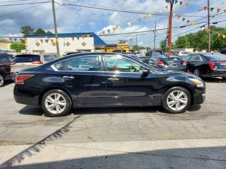 2015 Nissan Altima for sale at DAGO'S AUTO SALES LLC in Dalton, GA