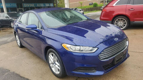 2014 Ford Fusion for sale at Divine Auto Sales LLC in Omaha NE