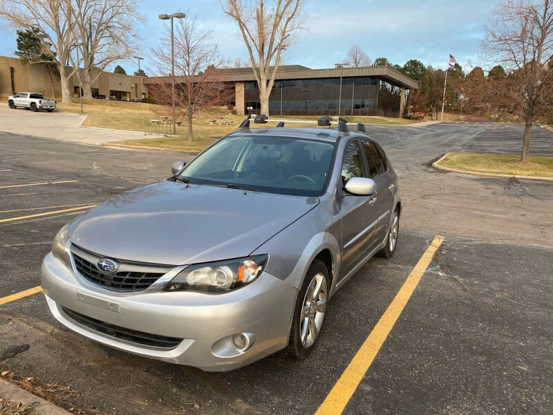 2011 Subaru Impreza for sale at QUEST MOTORS in Englewood CO