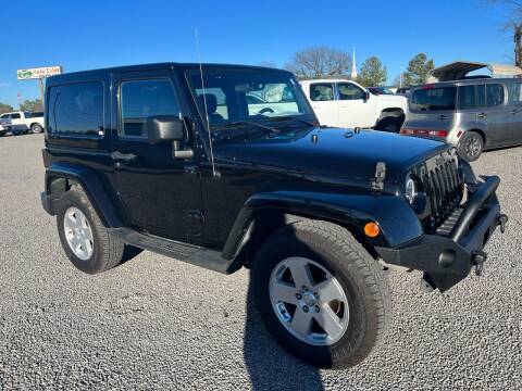 2012 Jeep Wrangler for sale at RAYMOND TAYLOR AUTO SALES in Fort Gibson OK