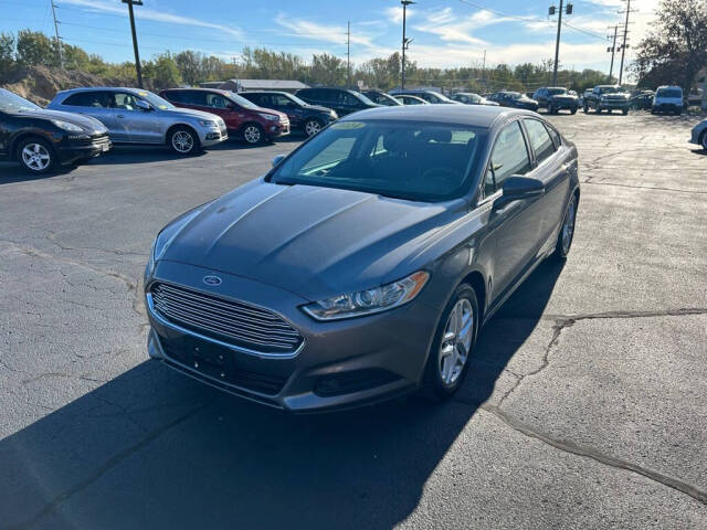 2014 Ford Fusion for sale at Wyrick Auto Sales & Leasing Inc in Zeeland, MI