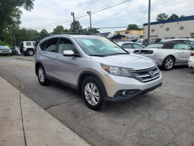 2014 Honda CR-V for sale at DAGO'S AUTO SALES LLC in Dalton, GA