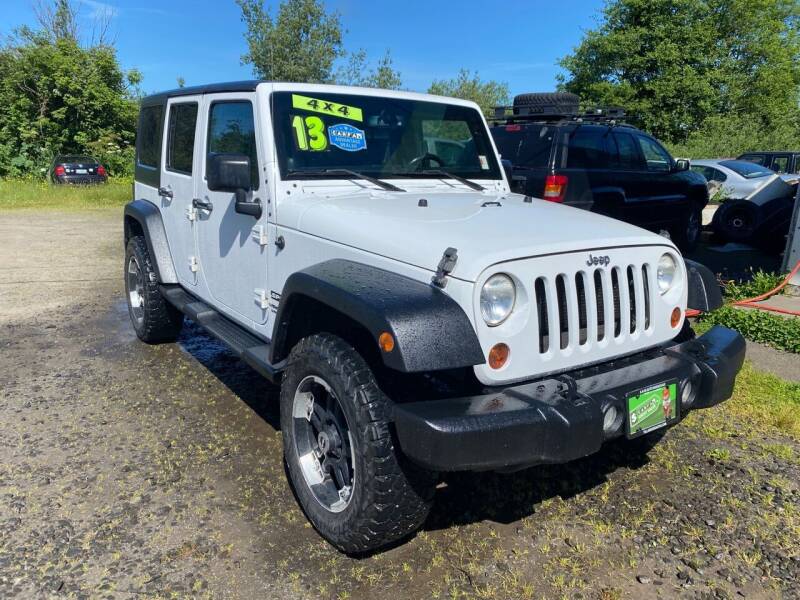 2013 Jeep Wrangler Unlimited for sale at A & M Auto Wholesale in Tillamook OR