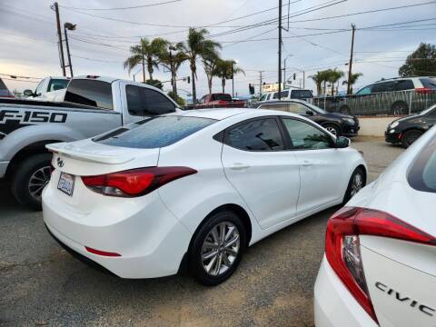 2014 Hyundai Elantra for sale at E and M Auto Sales in Bloomington CA