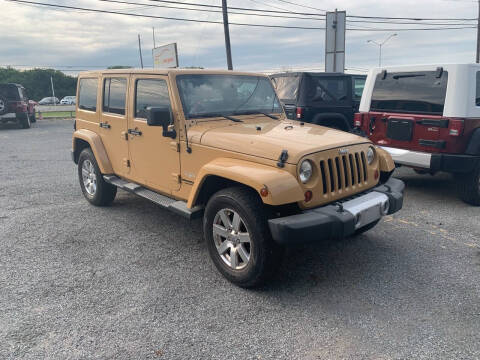 2013 Jeep Wrangler Unlimited for sale at The Jeep Stop in Sherman TX