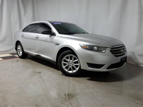 2015 Ford Taurus for sale at Tradewind Car Co in Muskegon MI
