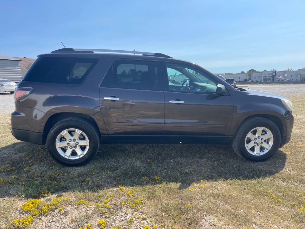 2015 GMC Acadia for sale at Madco Auto Sales in Bryant, AR