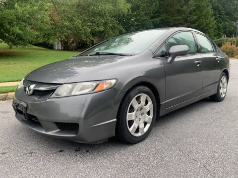 2010 Honda Civic for sale at SHURE AUTO SALES in Snellville GA