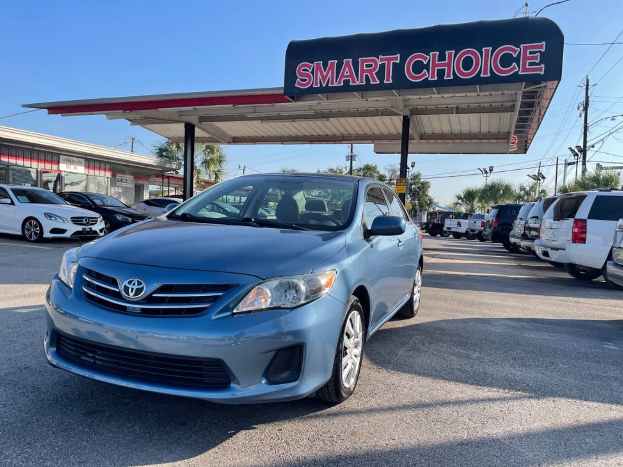 2013 Toyota Corolla for sale at SMART CHOICE AUTO in Pasadena, TX