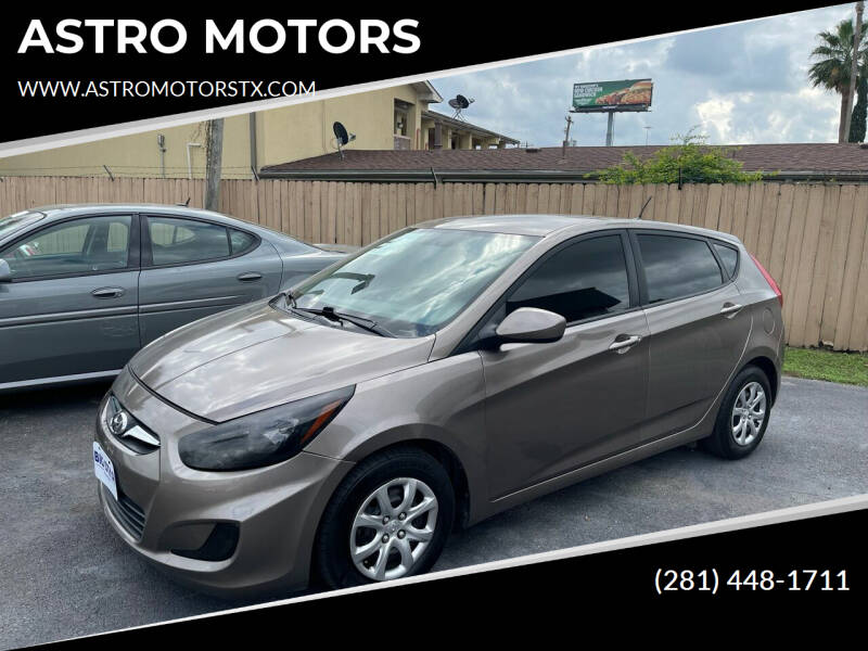 2014 Hyundai Accent for sale at ASTRO MOTORS in Houston TX