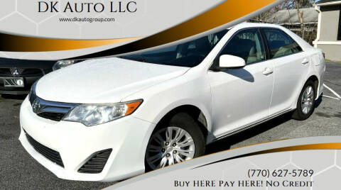 2014 Toyota Camry for sale at DK Auto LLC in Stone Mountain GA