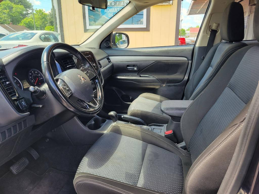 2016 Mitsubishi Outlander for sale at DAGO'S AUTO SALES LLC in Dalton, GA