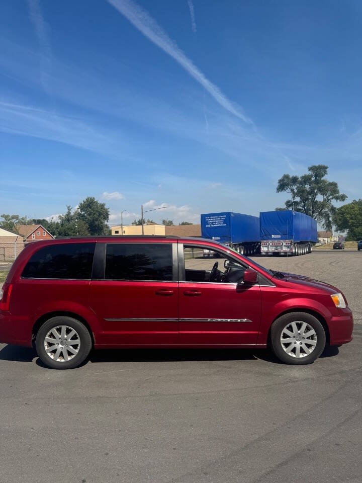 2012 Chrysler Town and Country for sale at H & H AUTO GROUP in Detroit, MI