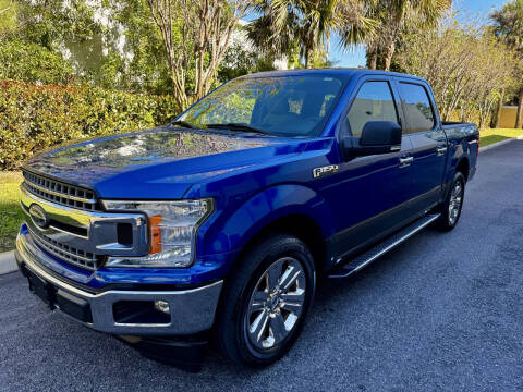 2018 Ford F-150 for sale at DENMARK AUTO BROKERS in Riviera Beach FL