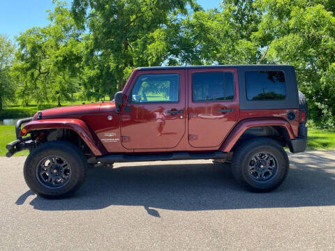2009 Jeep Wrangler Unlimited for sale at Family Auto Sales llc in Fenton MI