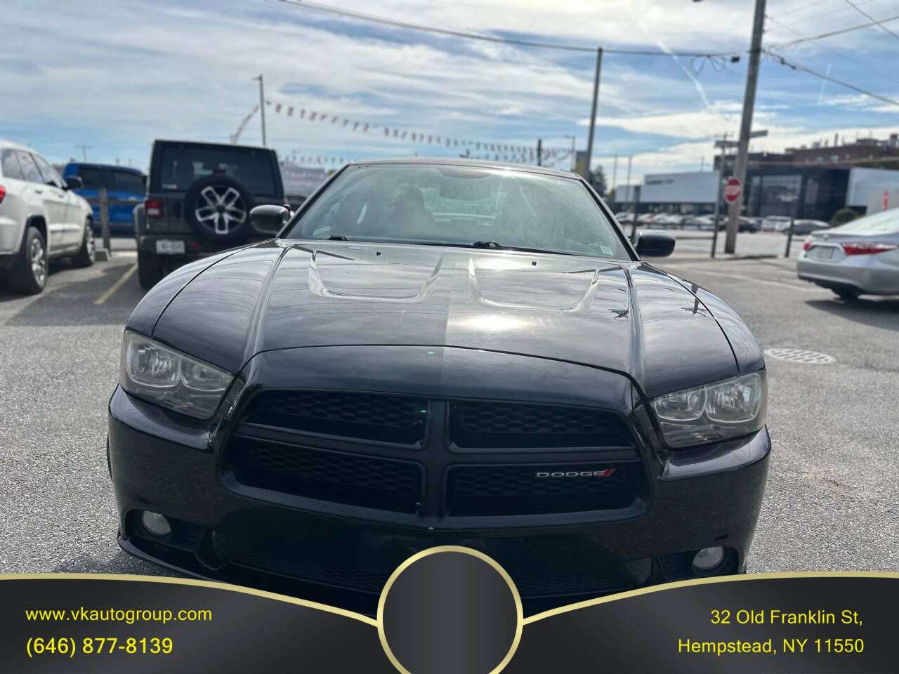 2014-dodge-charger-sxt-sedan-4d.jpg