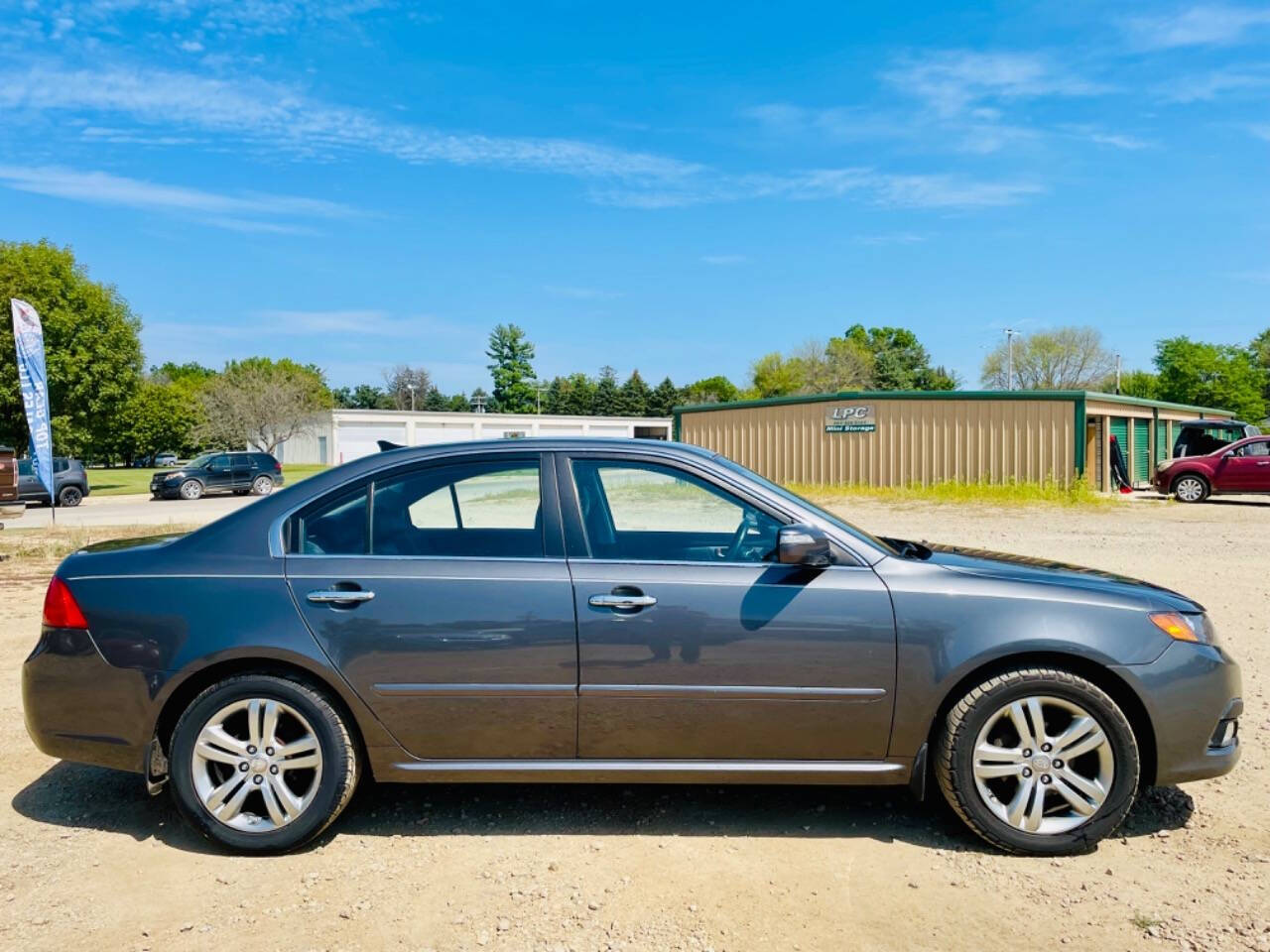 2009 Kia Optima for sale at Top Gear Auto Sales LLC in Le Roy, MN