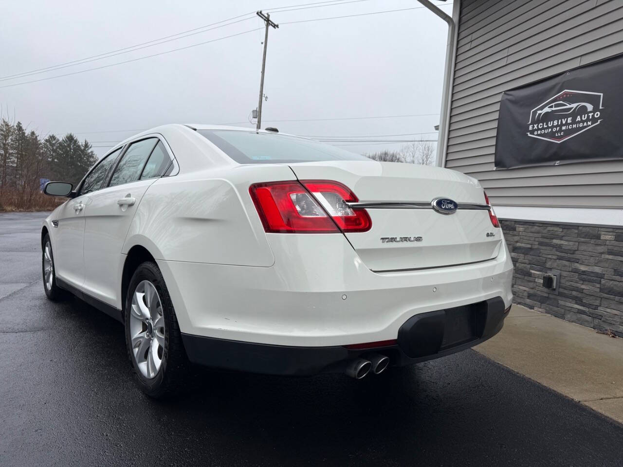 2011 Ford Taurus for sale at Exclusive Auto Group of Michigan LLC in Lansing, MI