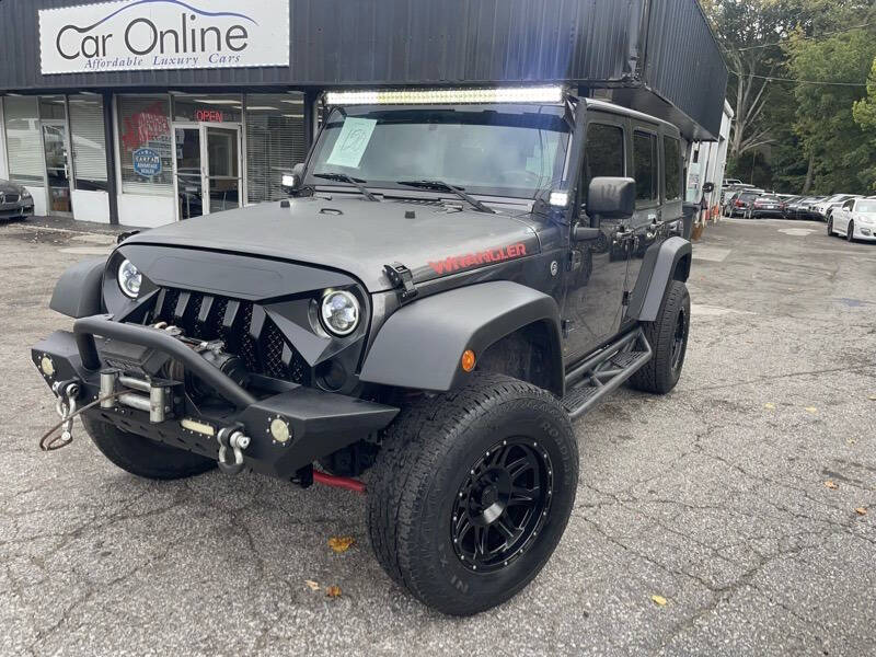 2014 Jeep Wrangler Unlimited for sale at Car Online in Roswell GA