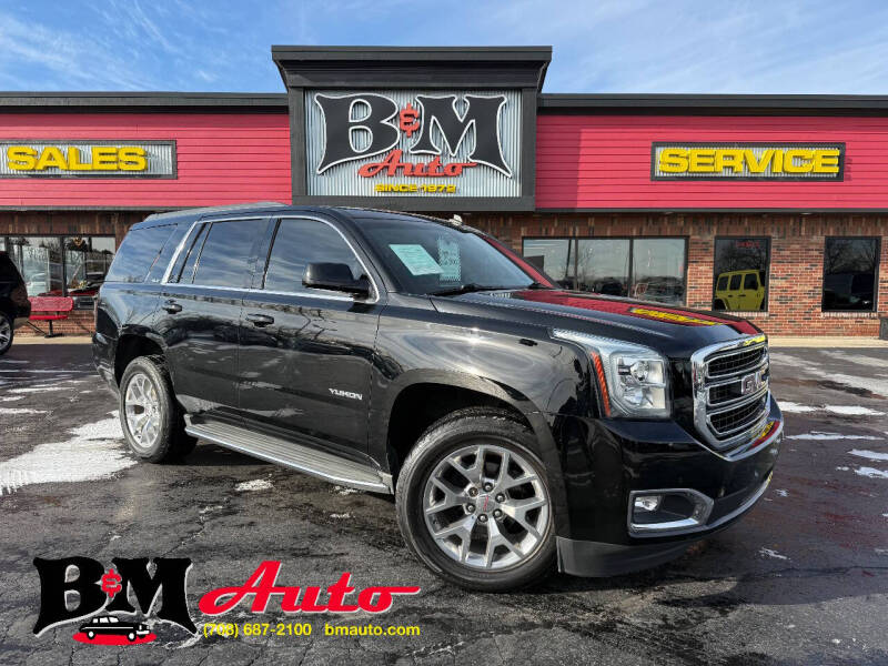 2015 GMC Yukon for sale at B & M Auto Sales Inc. in Oak Forest IL