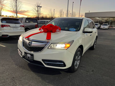 2014 Acura MDX for sale at Charlotte Auto Group, Inc in Monroe NC
