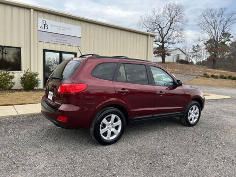 2009 Hyundai Santa Fe for sale at B & B AUTO SALES INC in Odenville AL