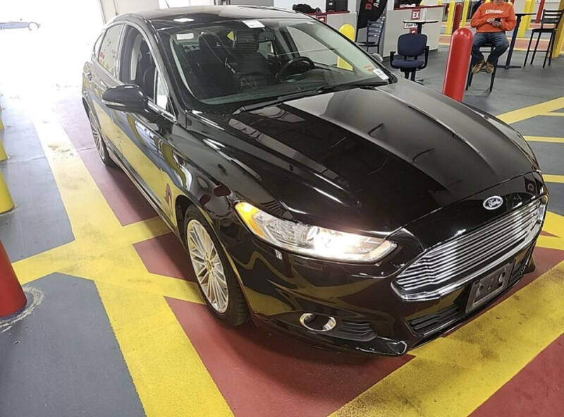 2016 Ford Fusion for sale at J & E AUTOMALL in Pelham NH