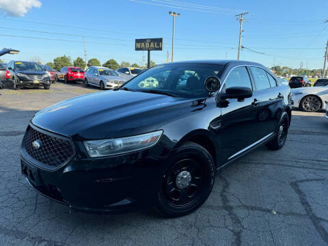 2013 Ford Taurus for sale at ALNABALI AUTO MALL INC. in Machesney Park IL