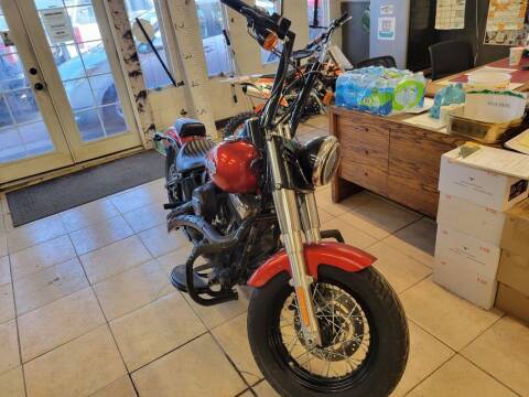 2014 Harley-Davidson Softail for sale at BERKENKOTTER MOTORS in Brighton CO