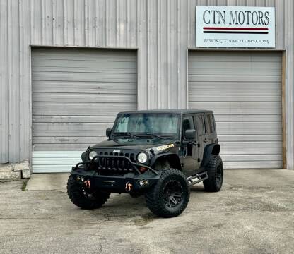 2010 Jeep Wrangler Unlimited for sale at CTN MOTORS in Houston TX