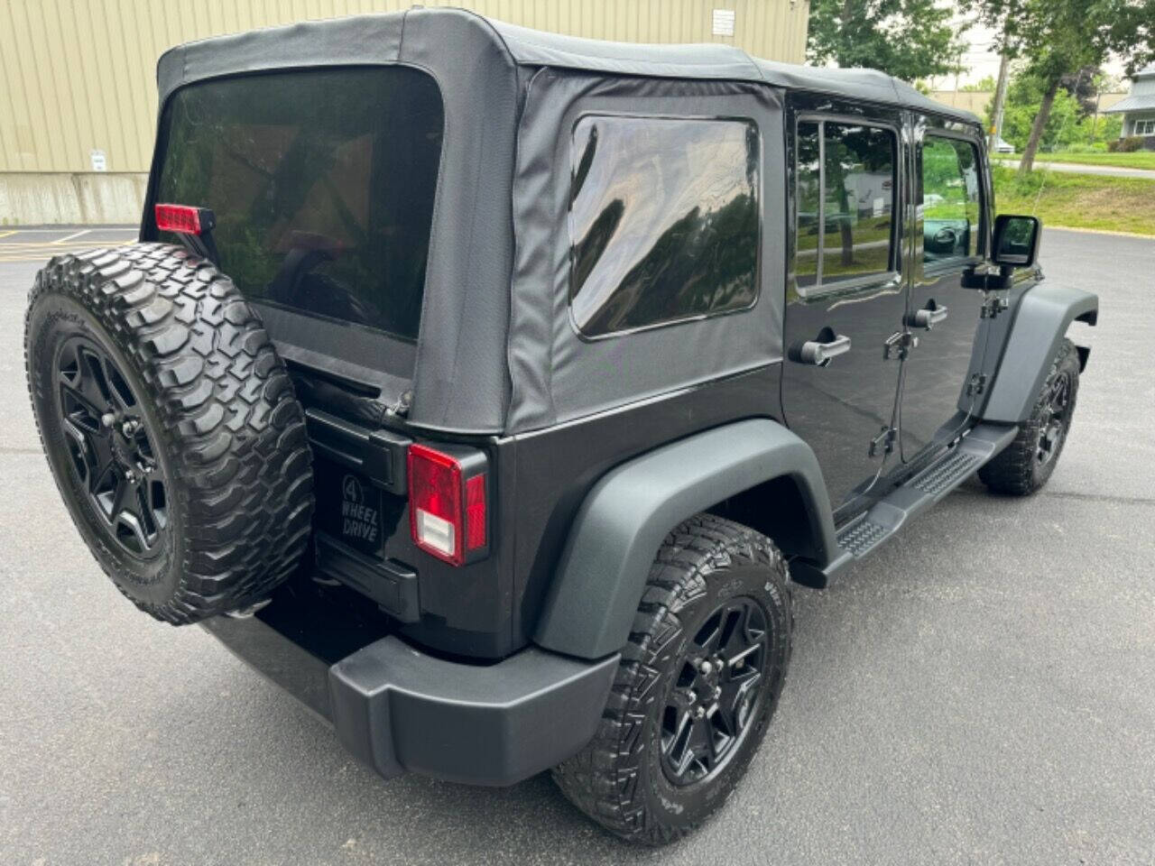 2016 Jeep Wrangler Unlimited for sale at BRW Motorsports LLC in Derry, NH