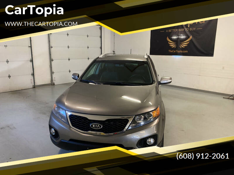 2012 Kia Sorento for sale at CarTopia in Deforest WI