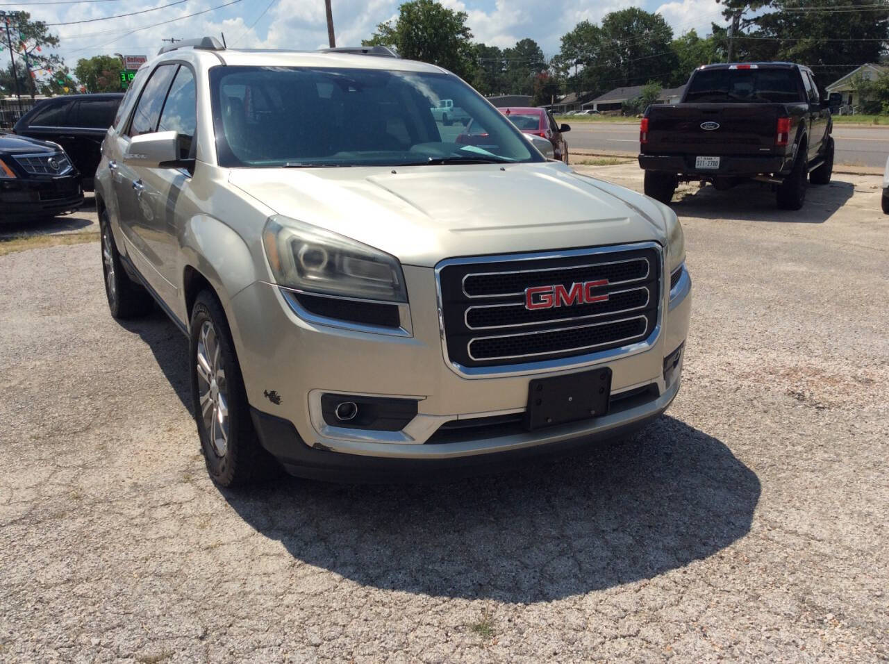 2014 GMC Acadia for sale at SPRINGTIME MOTORS in Huntsville, TX