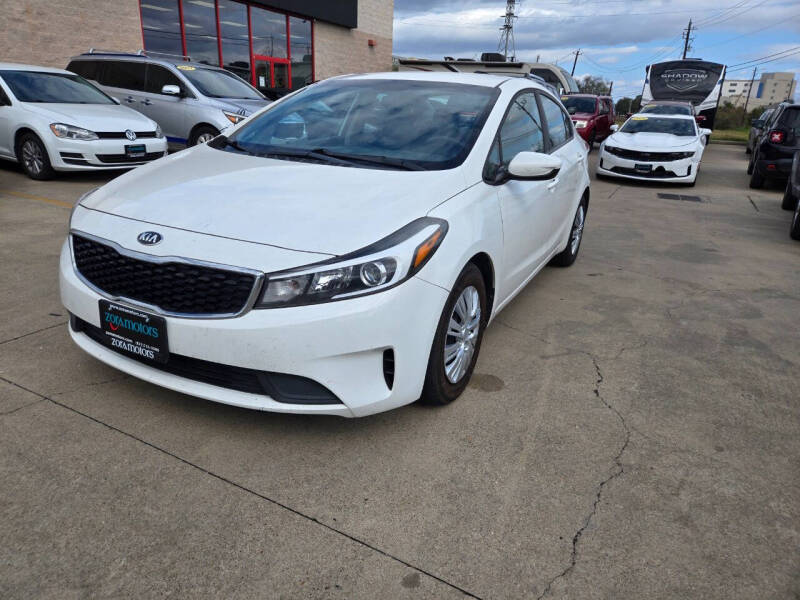 2017 Kia Forte for sale at ZORA MOTORS in Rosenberg TX