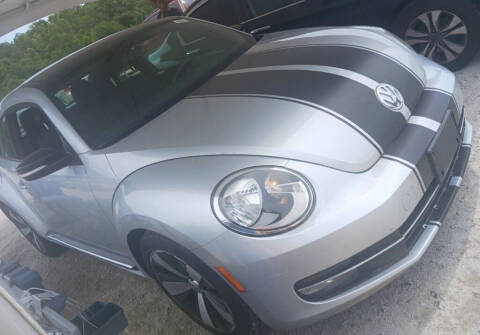 2012 Volkswagen Beetle for sale at Dixie Motors Inc. in Northport AL