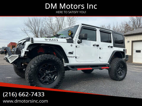 2015 Jeep Wrangler Unlimited for sale at DM Motors Inc in Maple Heights OH