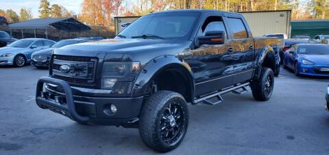 2014 Ford F-150 for sale at GEORGIA AUTO DEALER LLC in Buford GA
