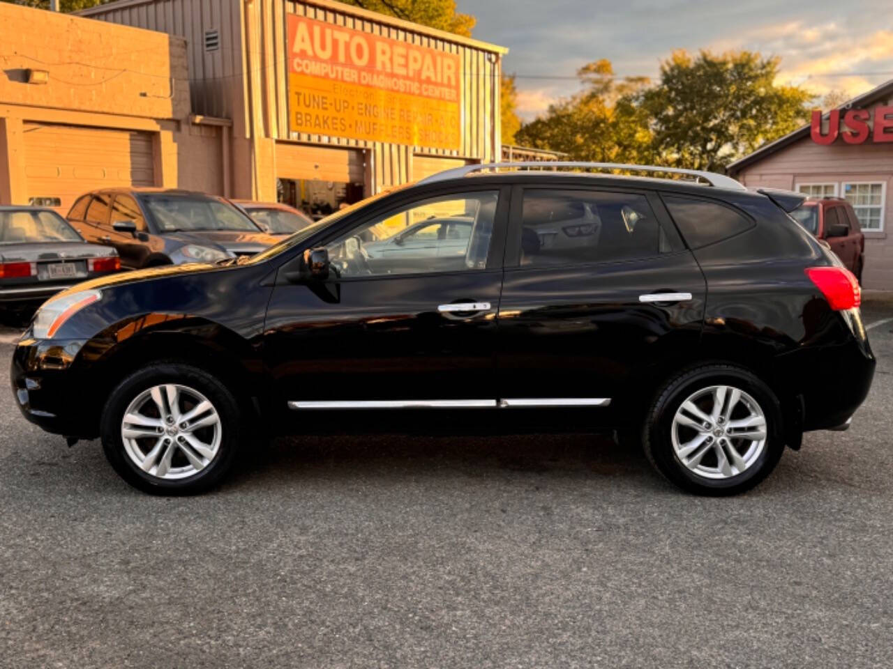 2013 Nissan Rogue for sale at Walkem Autos in District Heights, MD