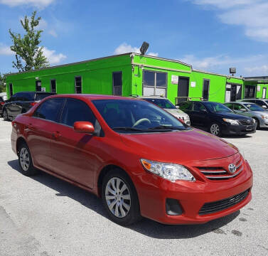 2013 Toyota Corolla for sale at Marvin Motors in Kissimmee FL