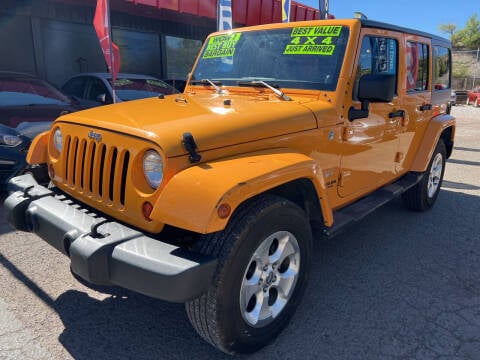 2013 Jeep Wrangler Unlimited for sale at Duke City Auto LLC in Gallup NM