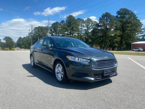 2015 Ford Fusion for sale at Carprime Outlet LLC in Angier NC