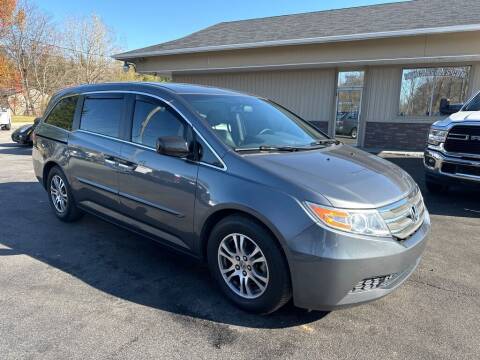 2012 Honda Odyssey for sale at RPM Auto Sales in Mogadore OH