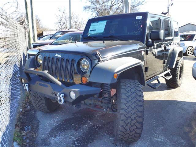 2013 Jeep Wrangler Unlimited for sale at WOOD MOTOR COMPANY in Madison TN