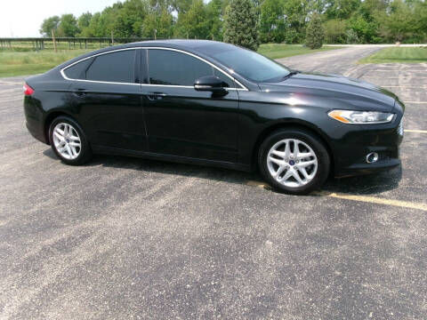 2015 Ford Fusion for sale at Crossroads Used Cars Inc. in Tremont IL