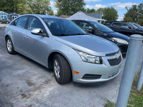 2013 Chevrolet Cruze for sale at HEDGES USED CARS in Carleton MI