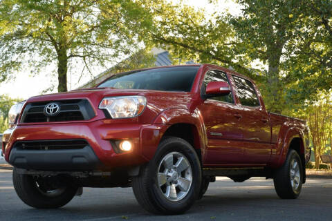 2013 Toyota Tacoma for sale at Carma Auto Group in Duluth GA